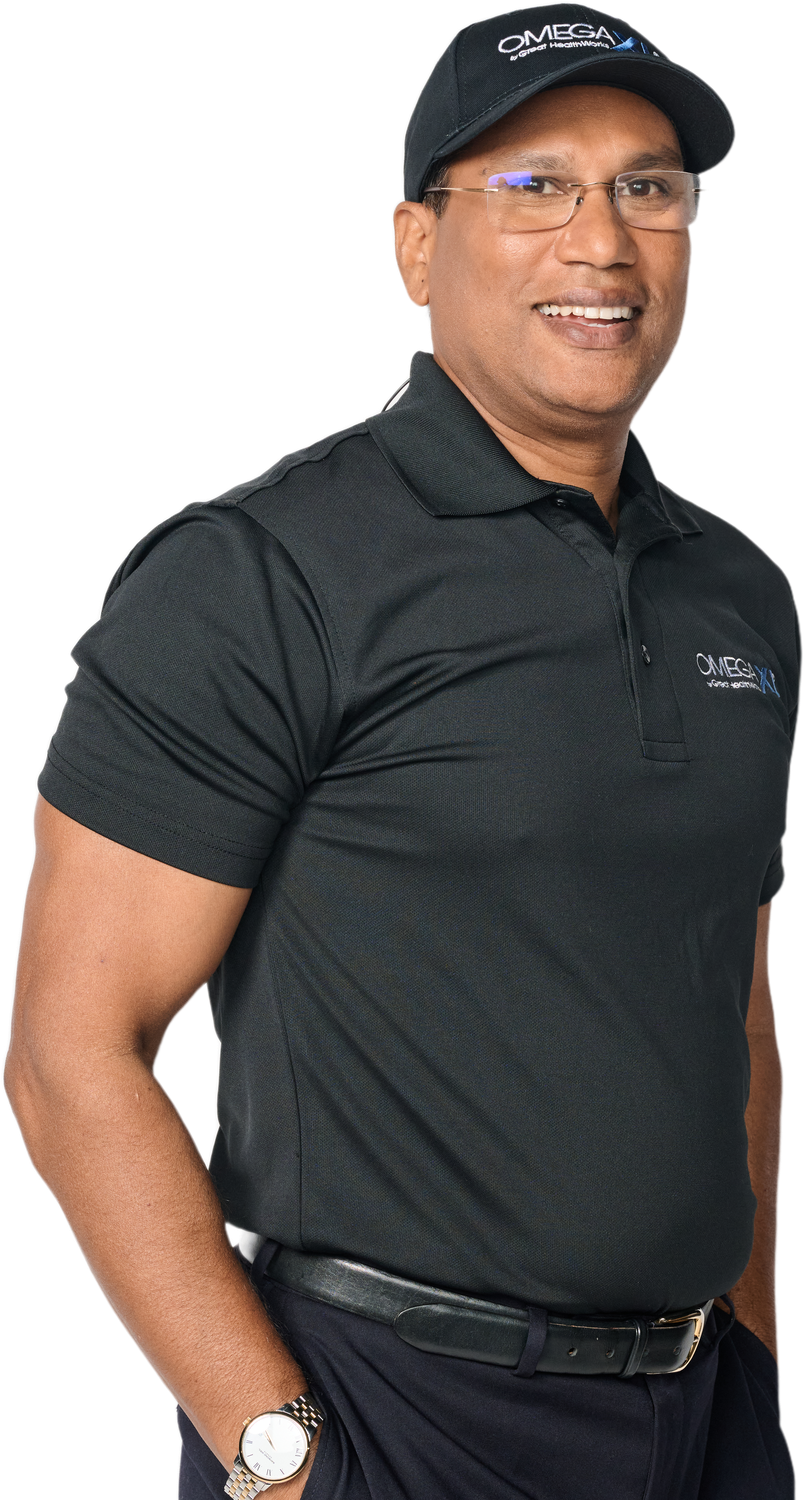 Joseph Sendall of XL Health TT Ltd in an Omega XL cap and shirt